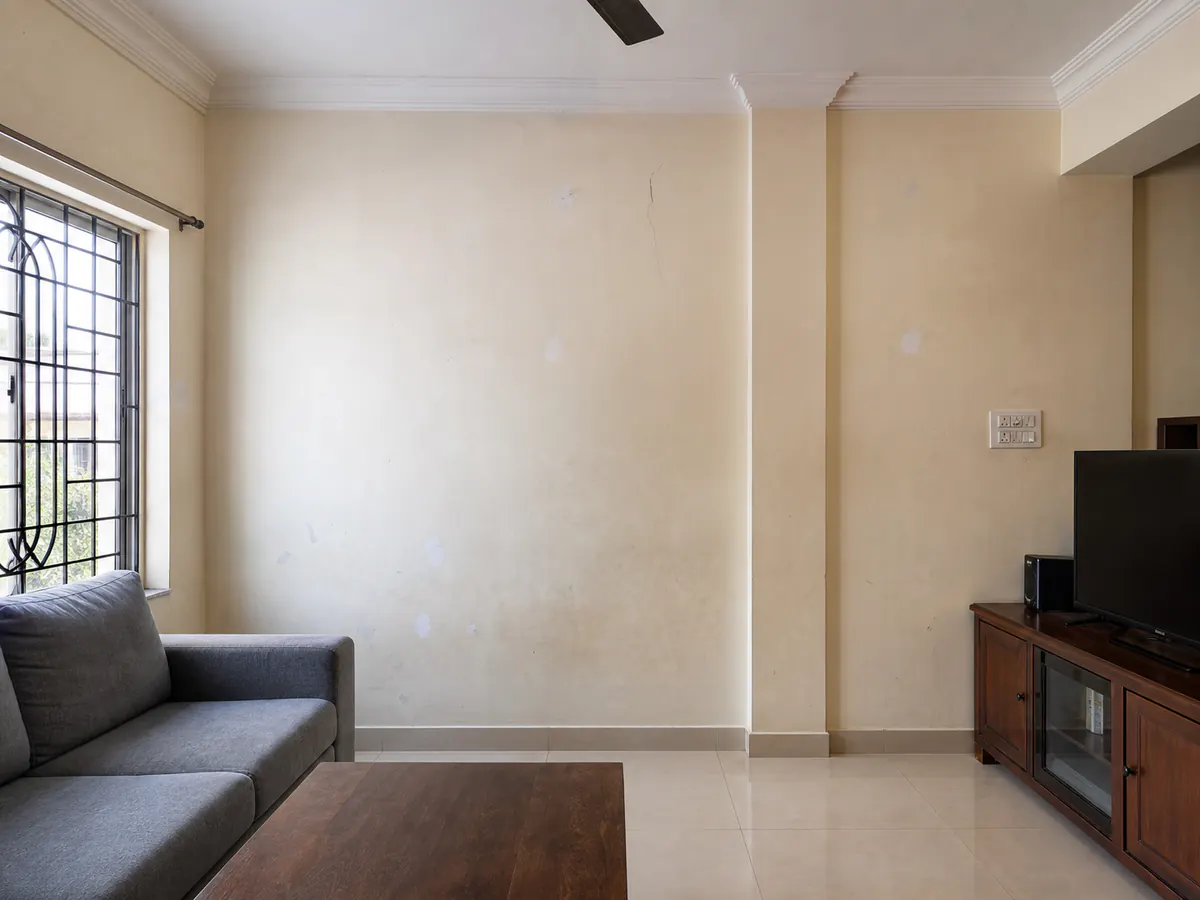Illustrative living room before interior repainting
