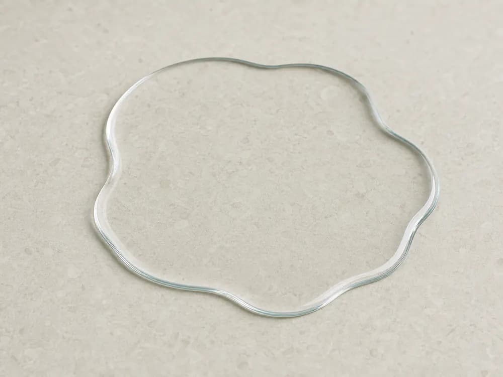 Realistic clear compatible paint thinner sample on a neutral mineral surface