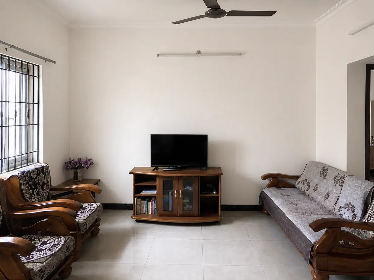 Same illustrative furnished room after surface preparation and repainting